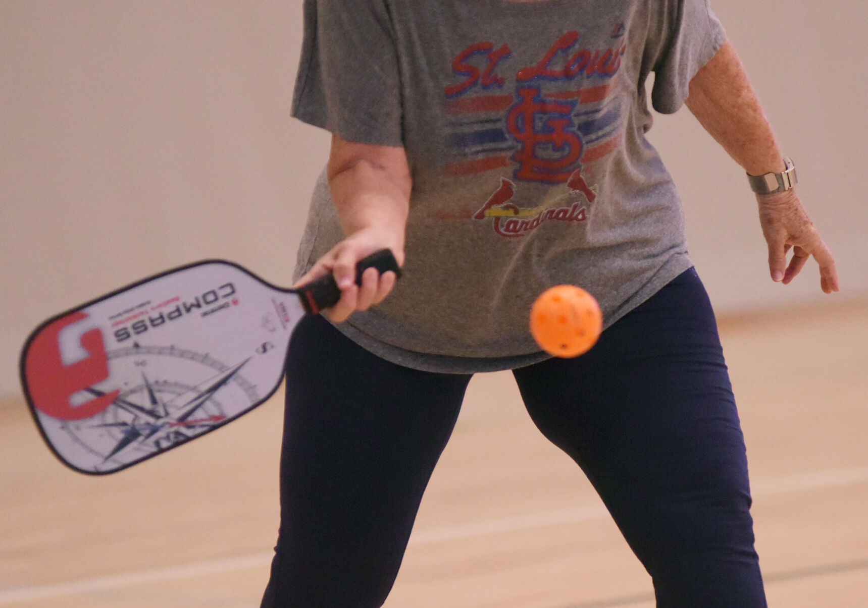 An athlete prepares to hit the ball